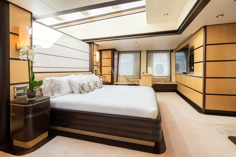 a large bed in a room aboard HARLE Yacht for Sale