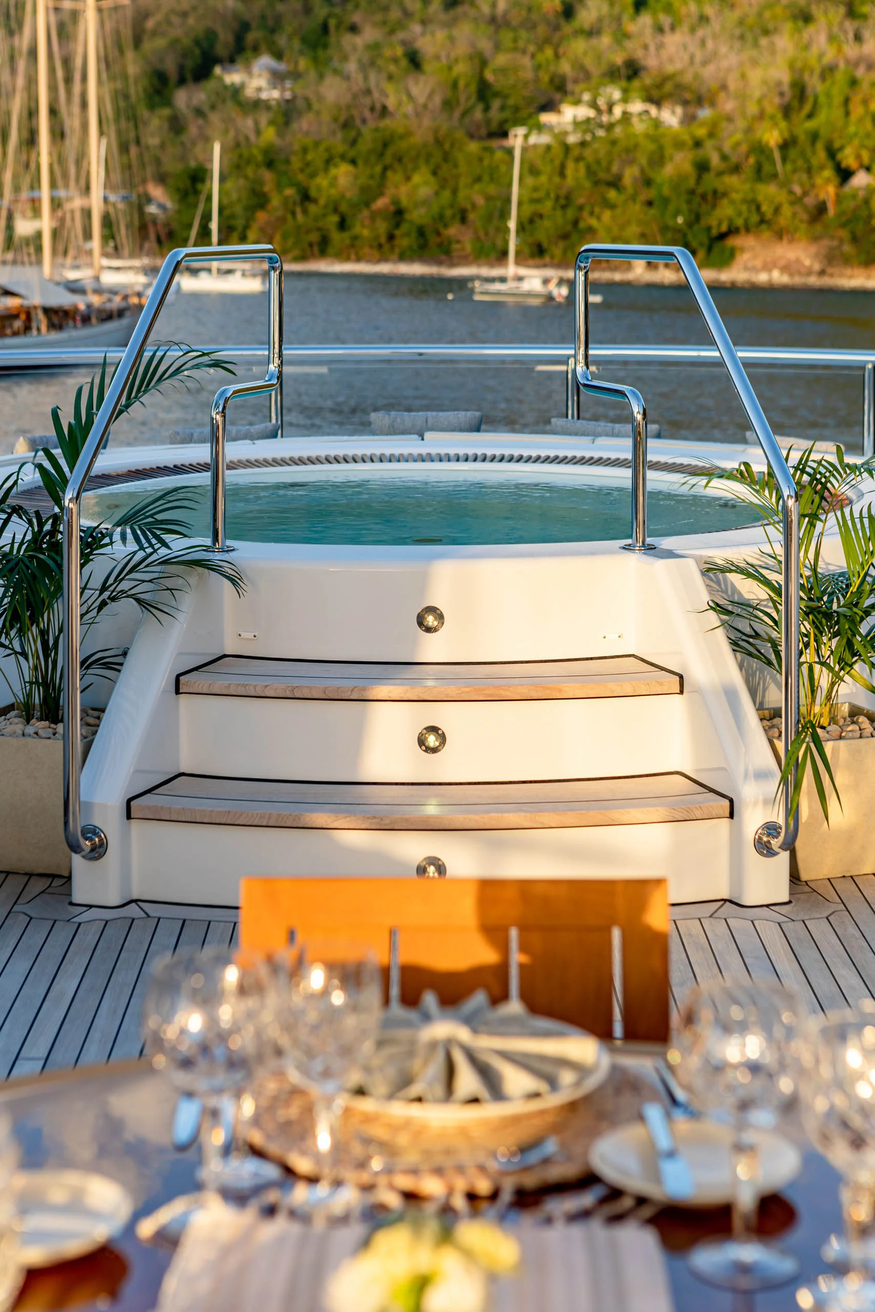 a white rectangular object with a basket on a table with a basket of food and a basket of aboard HARLE Yacht for Sale