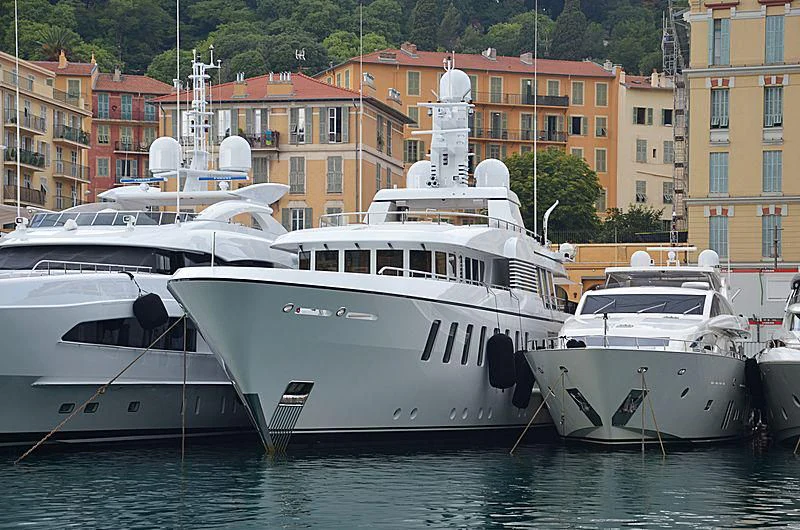several boats docked in a harbor aboard HARLE Yacht for Sale