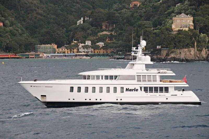 a white yacht on the water aboard HARLE Yacht for Sale