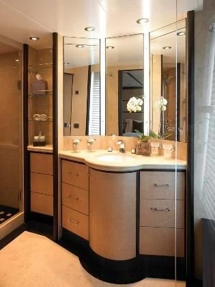 a bathroom with a sink and cabinets aboard HARLE Yacht for Sale