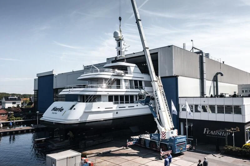 a large white boat docked aboard HARLE Yacht for Sale