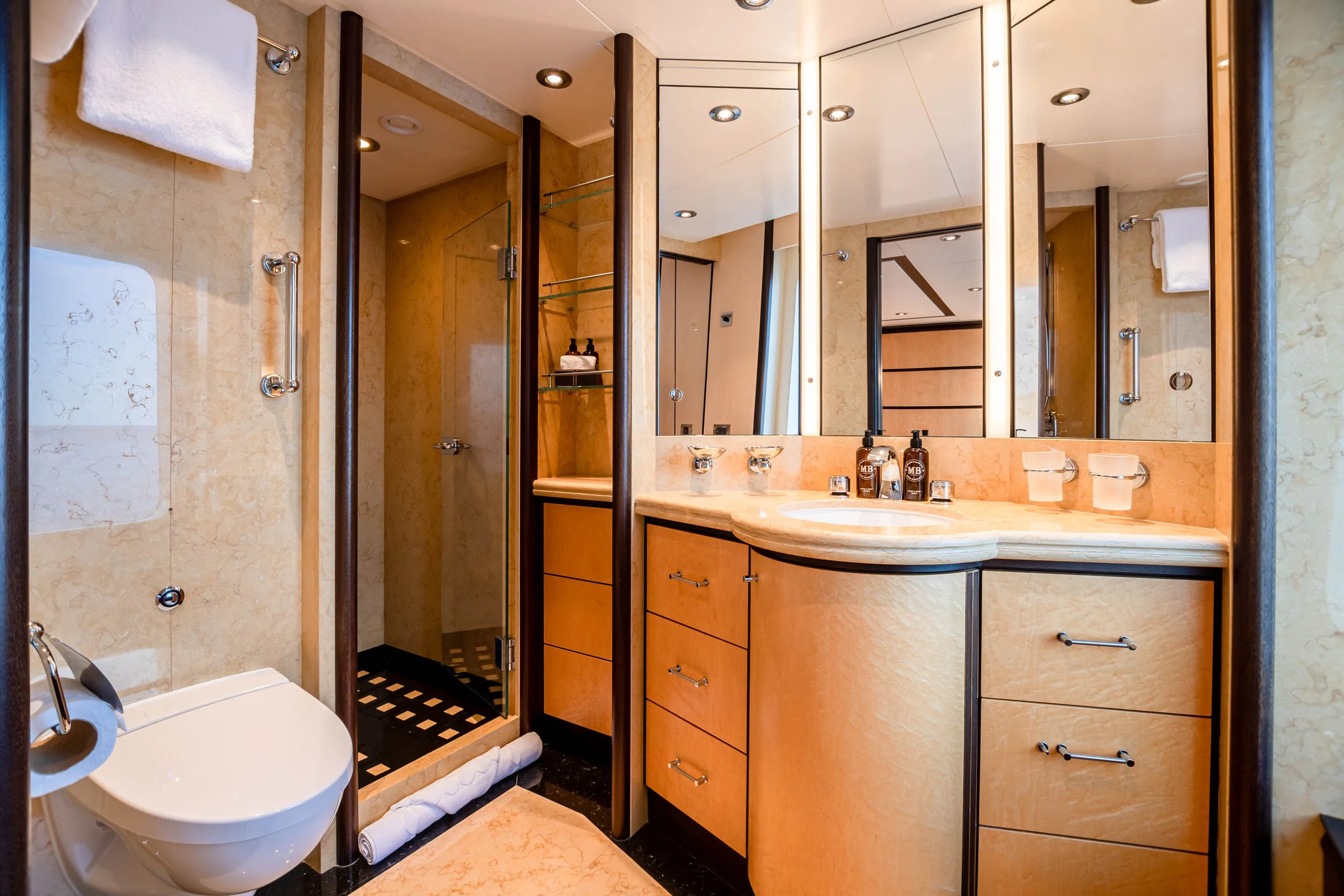 a bathroom with a large mirror aboard HARLE Yacht for Sale
