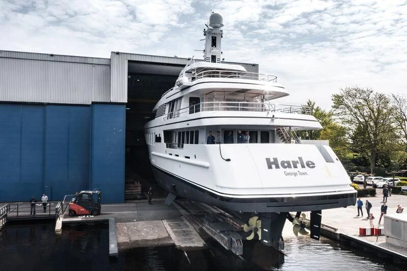 a large white boat docked aboard HARLE Yacht for Sale