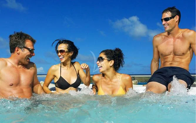 a group of people in the water aboard HARLE Yacht for Sale
