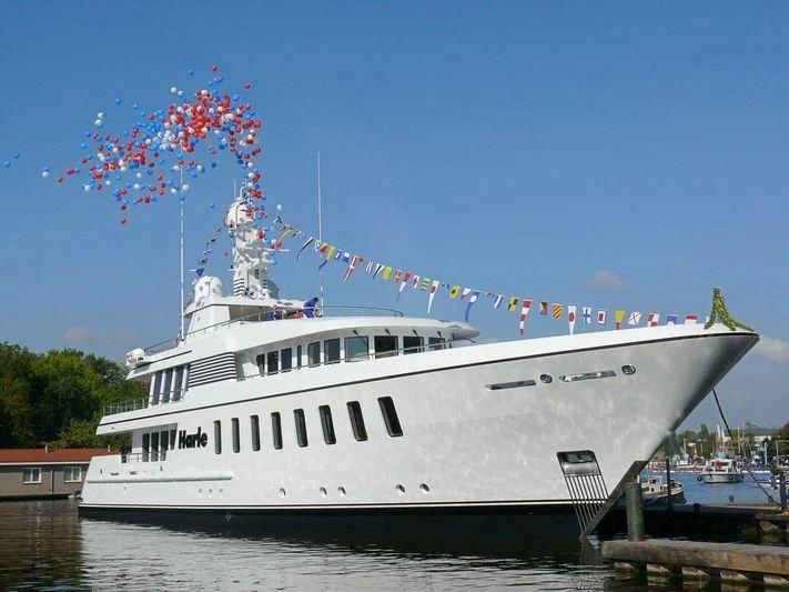 a boat with a lot of people on it aboard HARLE Yacht for Sale