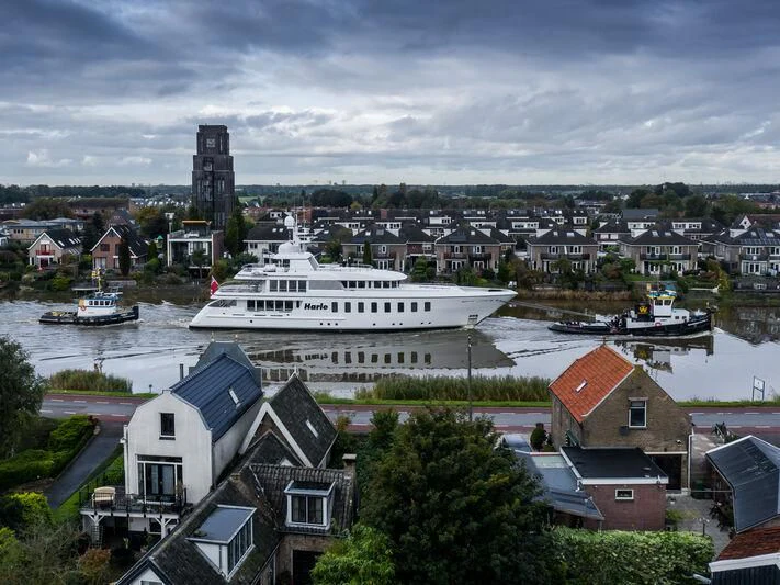 a large ship in a harbor aboard HARLE Yacht for Sale