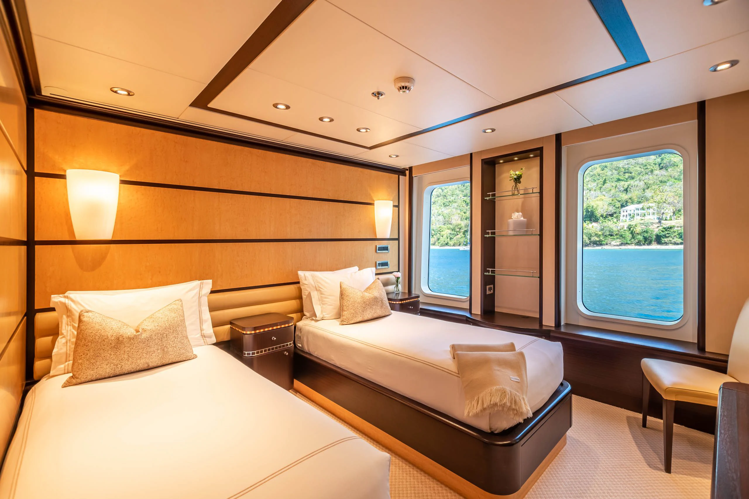 a room with a bed and a window aboard HARLE Yacht for Sale