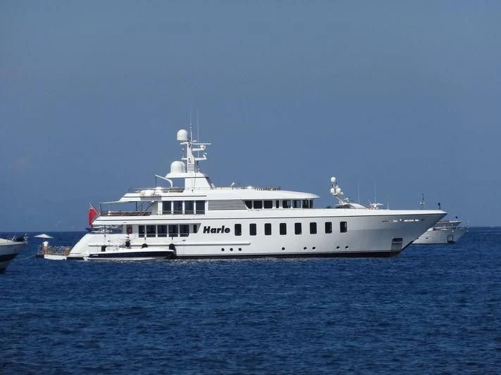 a white boat in the water aboard HARLE Yacht for Sale