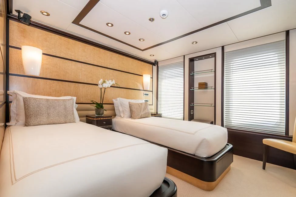 a room with two beds aboard HARLE Yacht for Sale