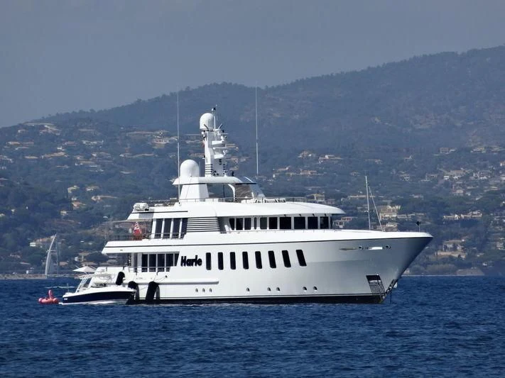 a large white boat in the water aboard HARLE Yacht for Sale