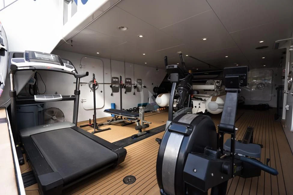 a gym with equipment aboard HARLE Yacht for Sale