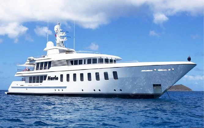 a large white ship in the water aboard HARLE Yacht for Sale