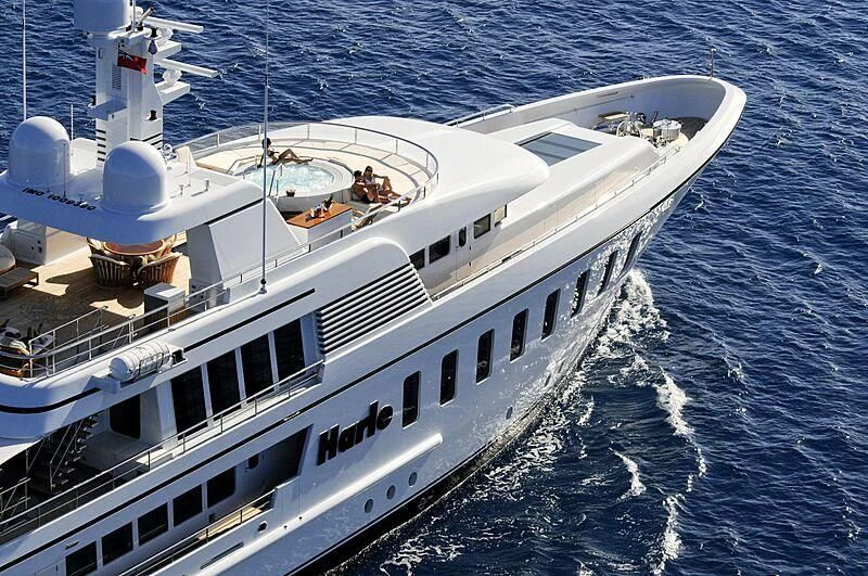 a white boat on the water aboard HARLE Yacht for Sale