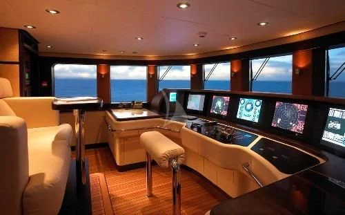 a room with a large window and a view of the ocean aboard HARLE Yacht for Sale