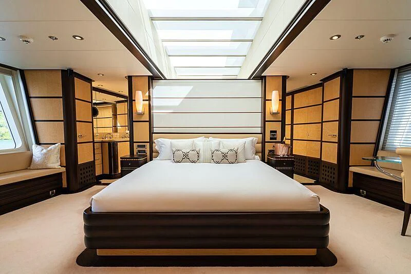a large bed in a room aboard HARLE Yacht for Sale