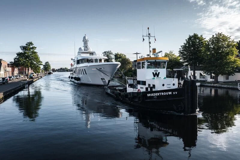a couple of boats are parked in the water aboard HARLE Yacht for Sale