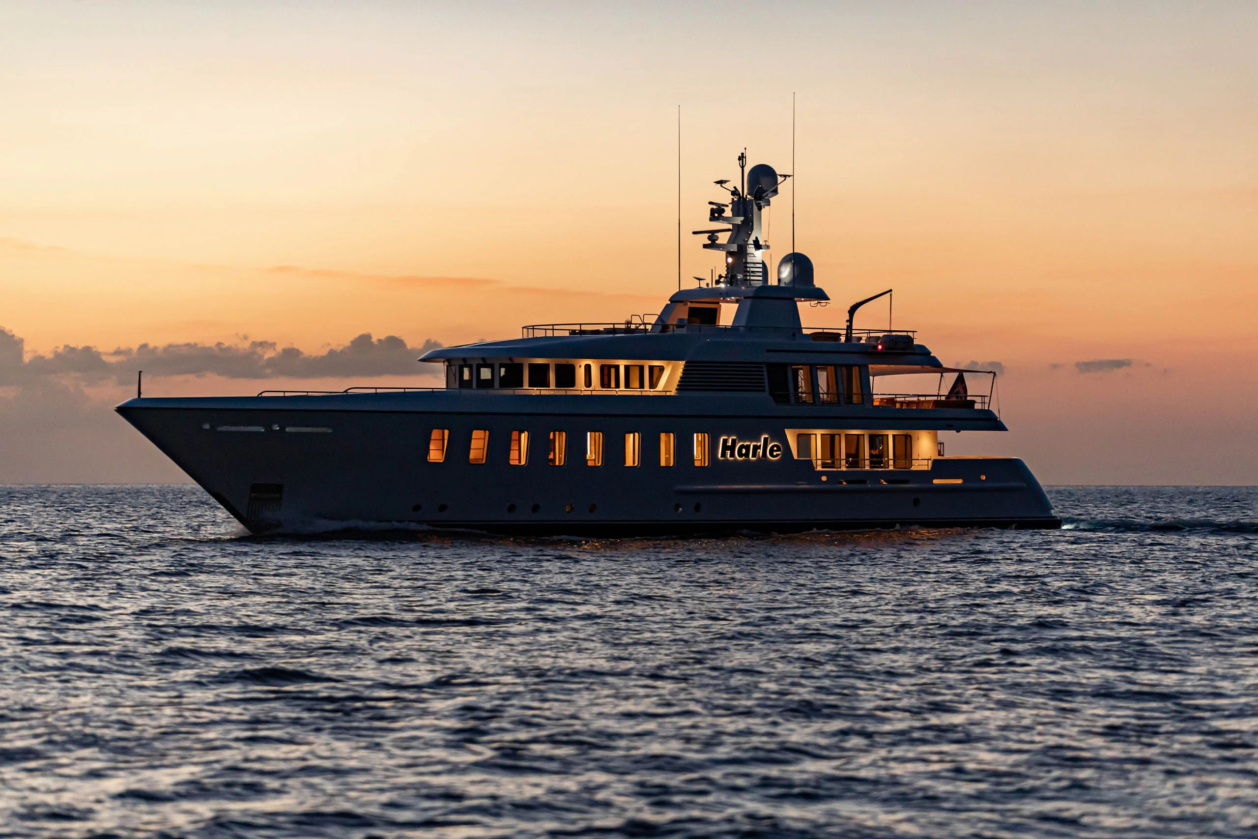 a large ship in the water aboard HARLE Yacht for Sale