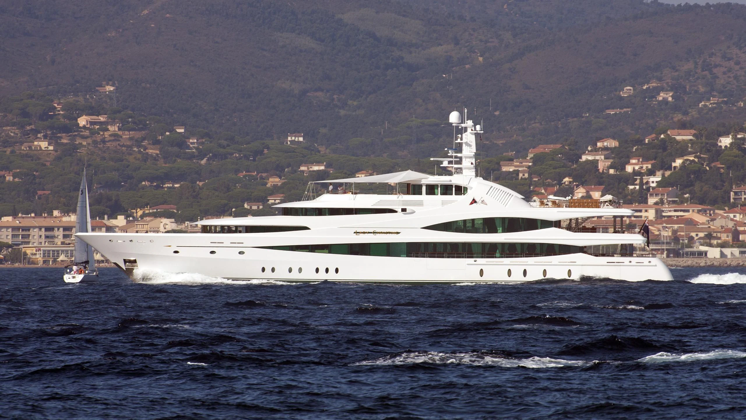 a large white boat in the water aboard LADY CHRISTINE Yacht for Sale