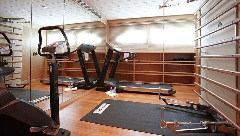 a gym with equipment aboard LADY CHRISTINE Yacht for Sale
