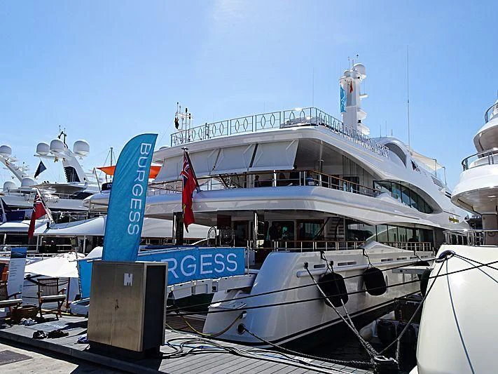 a large cruise ship docked aboard LADY CHRISTINE Yacht for Sale
