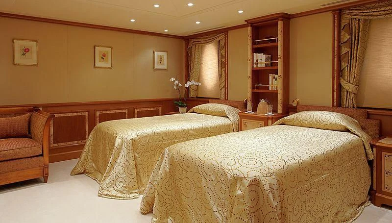a room with two beds aboard LADY CHRISTINE Yacht for Sale