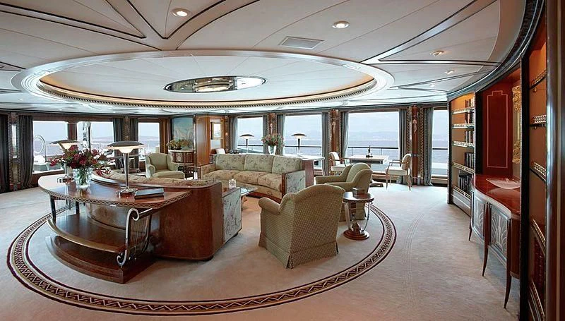 a large living room with a large open floor plan aboard LADY CHRISTINE Yacht for Sale