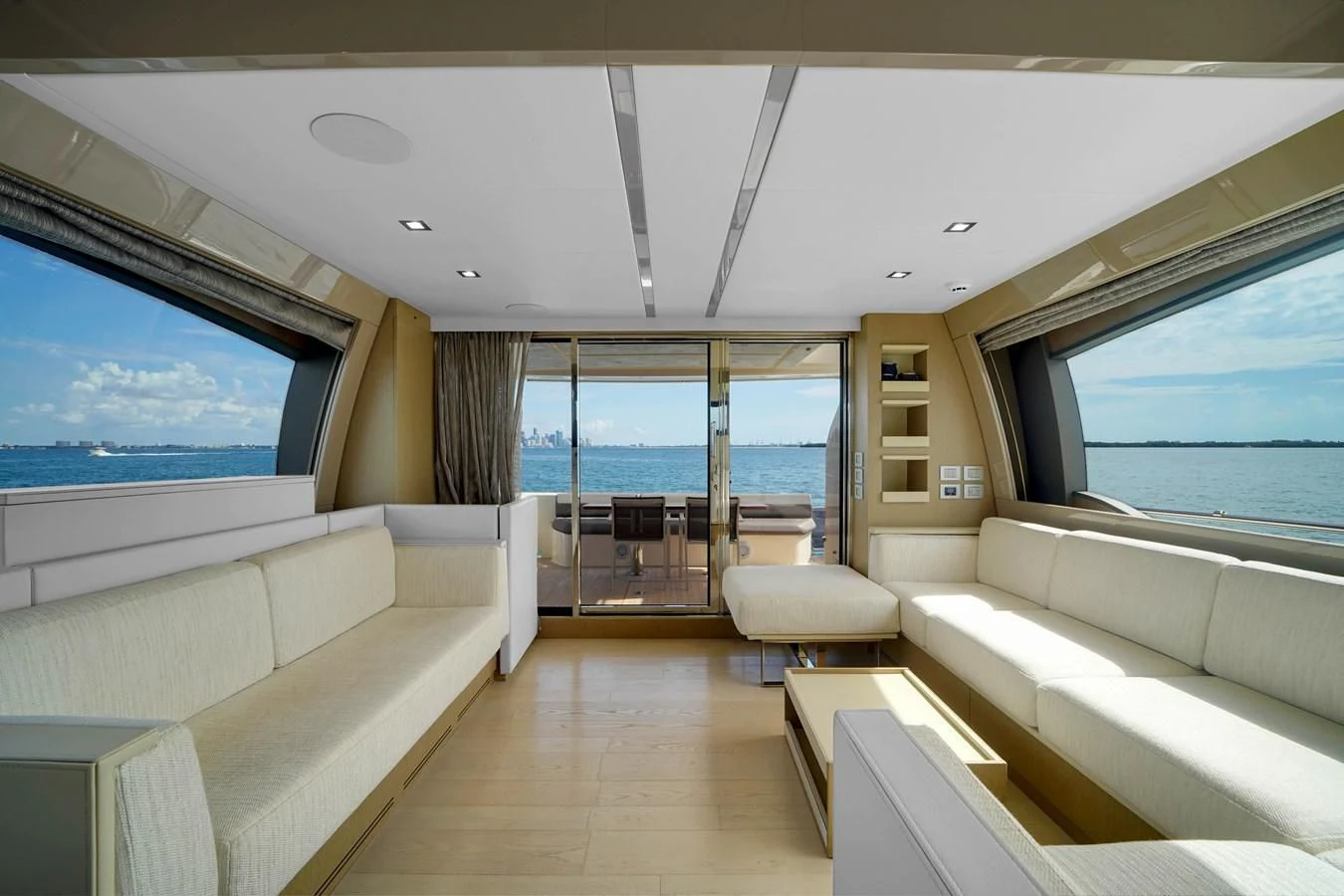 a living room with a large window aboard KATARIINA XO Yacht for Sale