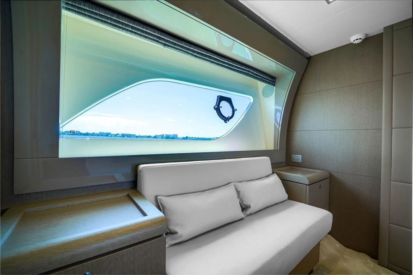 a room with a couch and a large window aboard KATARIINA XO Yacht for Sale