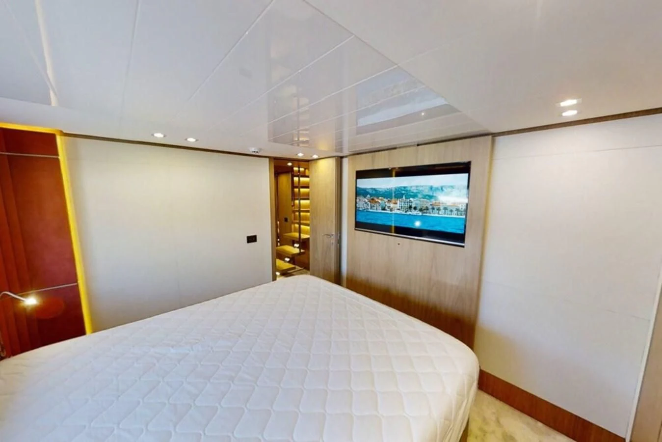 a bed in a room aboard KATARIINA XO Yacht for Sale