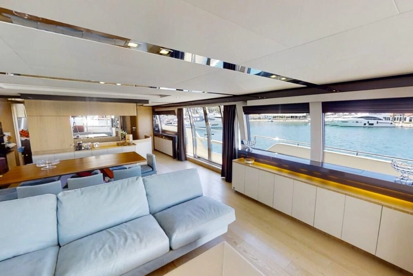 a room with a couch and a window aboard KATARIINA XO Yacht for Sale