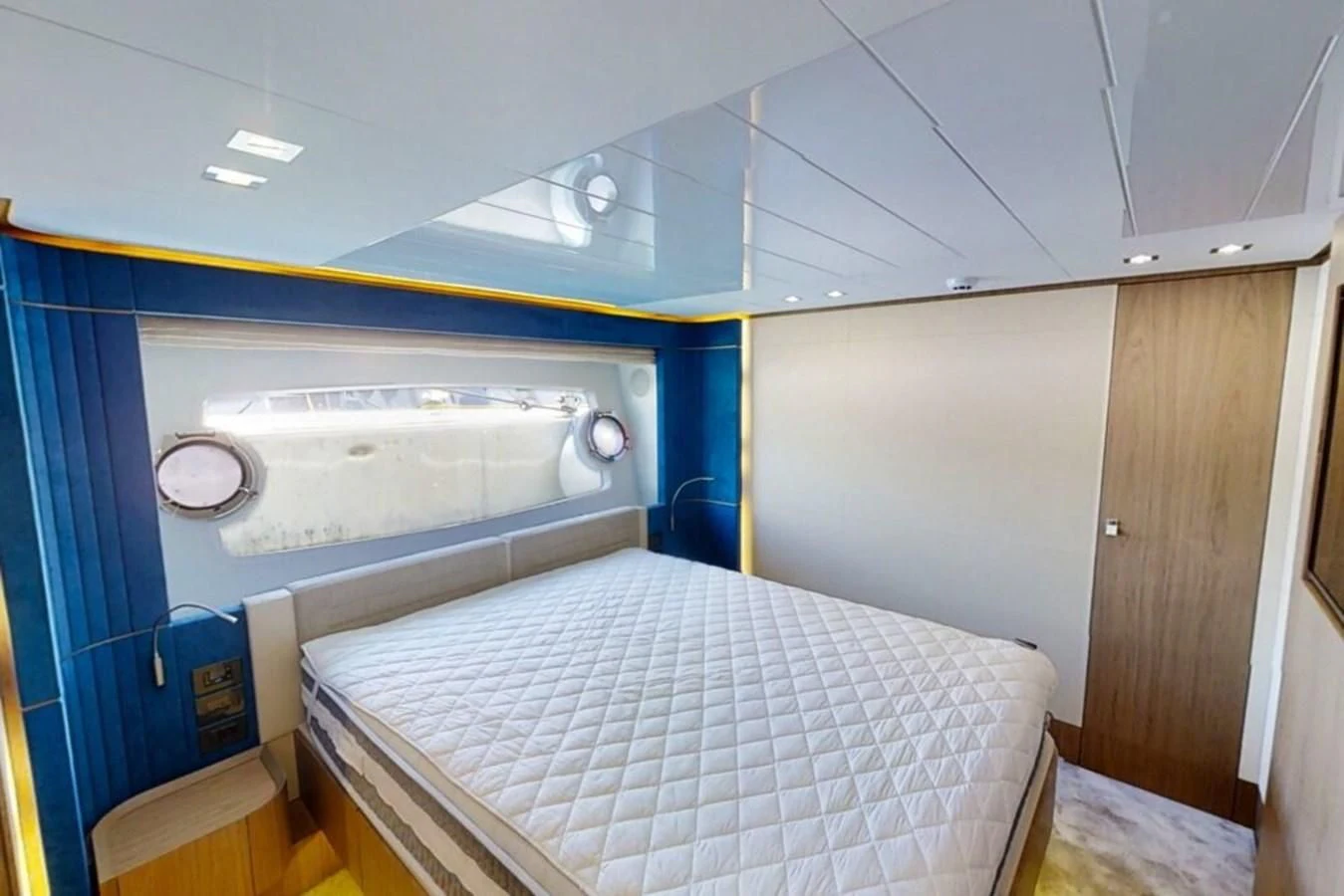 a bed in a room aboard KATARIINA XO Yacht for Sale