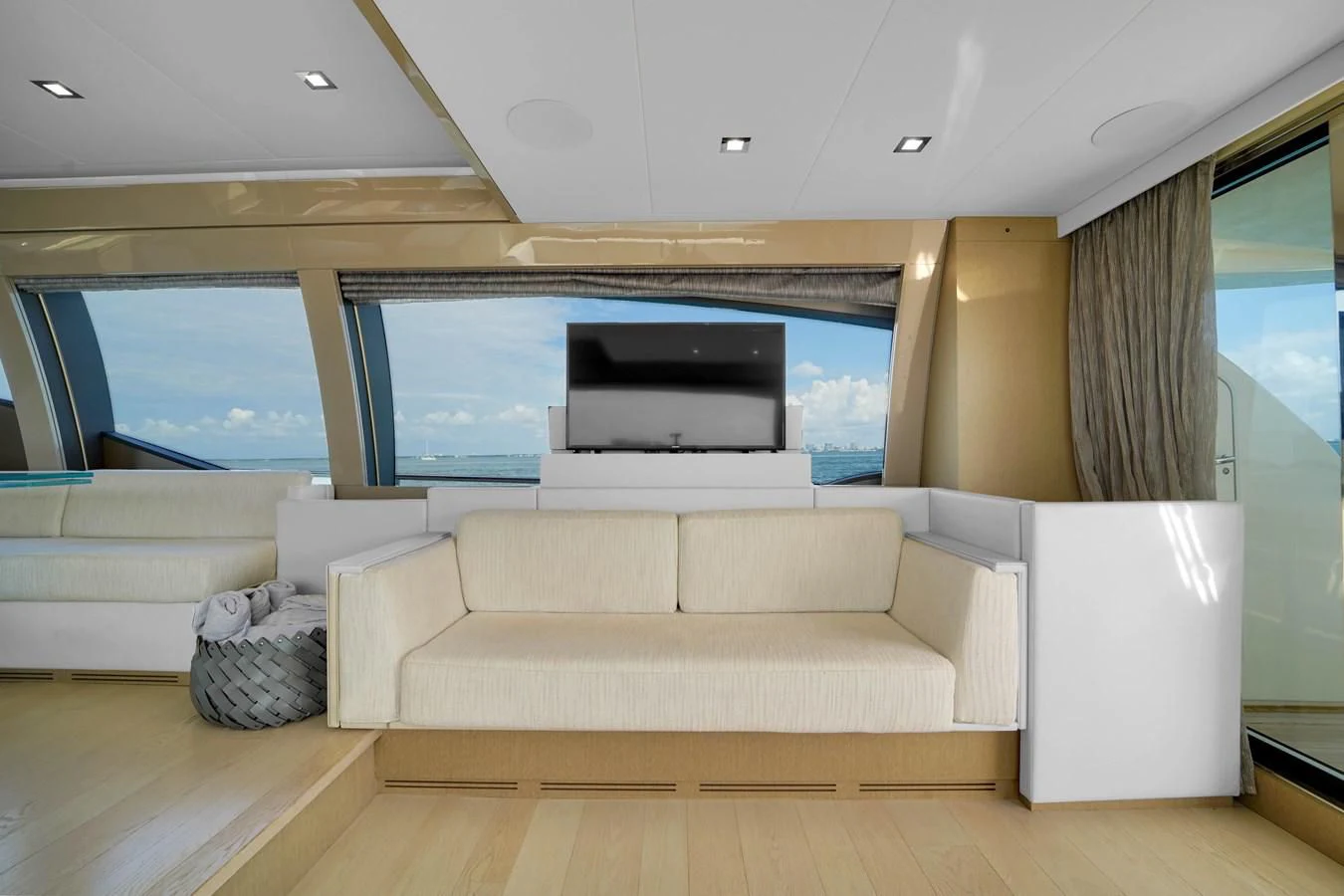 a living room with a large window aboard KATARIINA XO Yacht for Sale