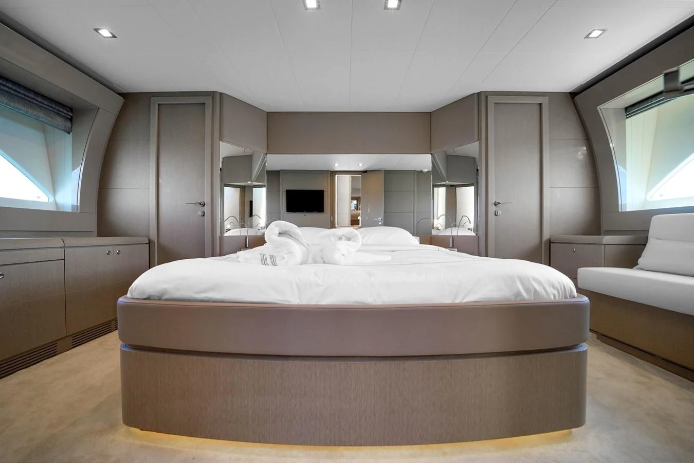 a room with a bed and a couch aboard KATARIINA XO Yacht for Sale