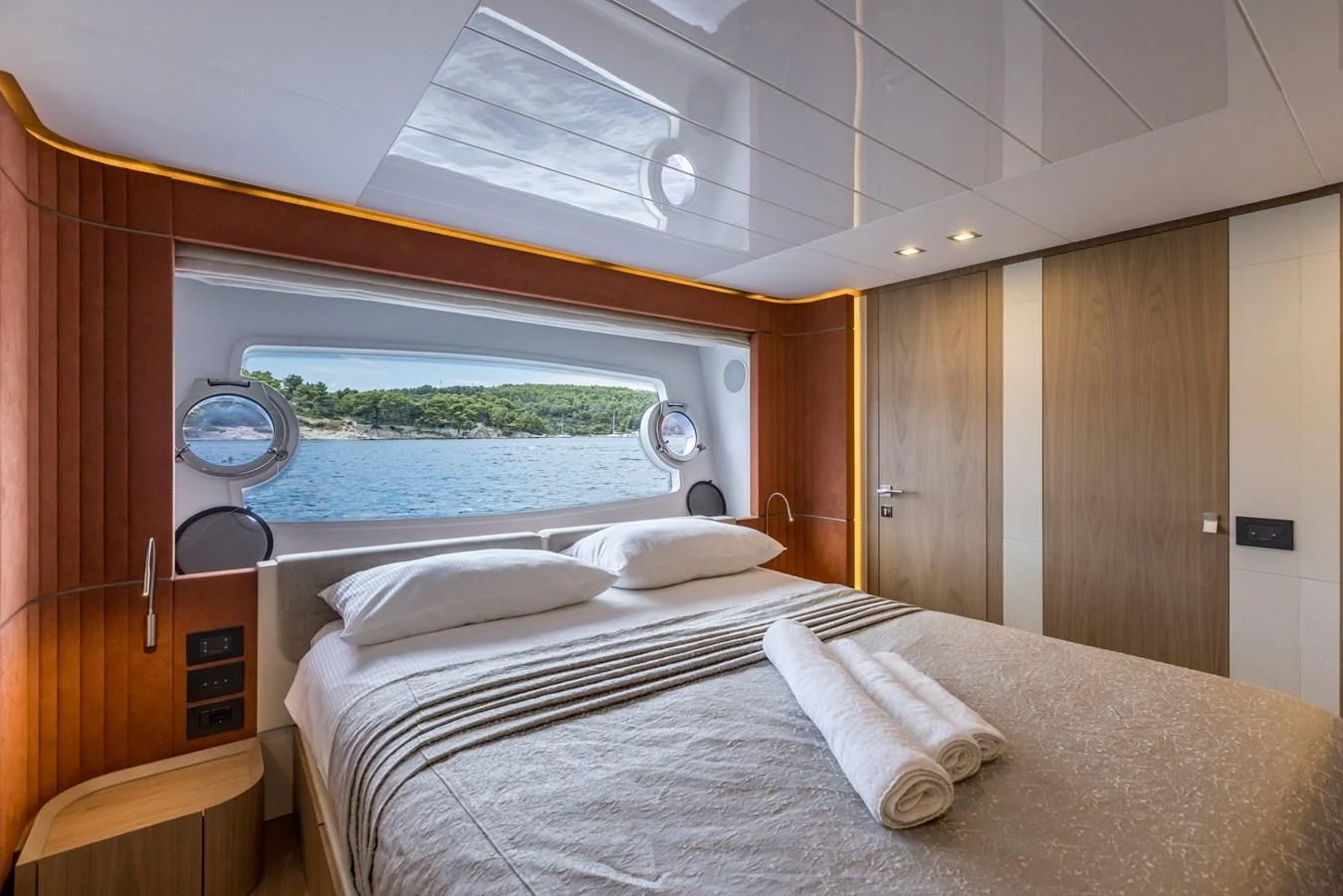 a bed in a room aboard KATARIINA XO Yacht for Sale