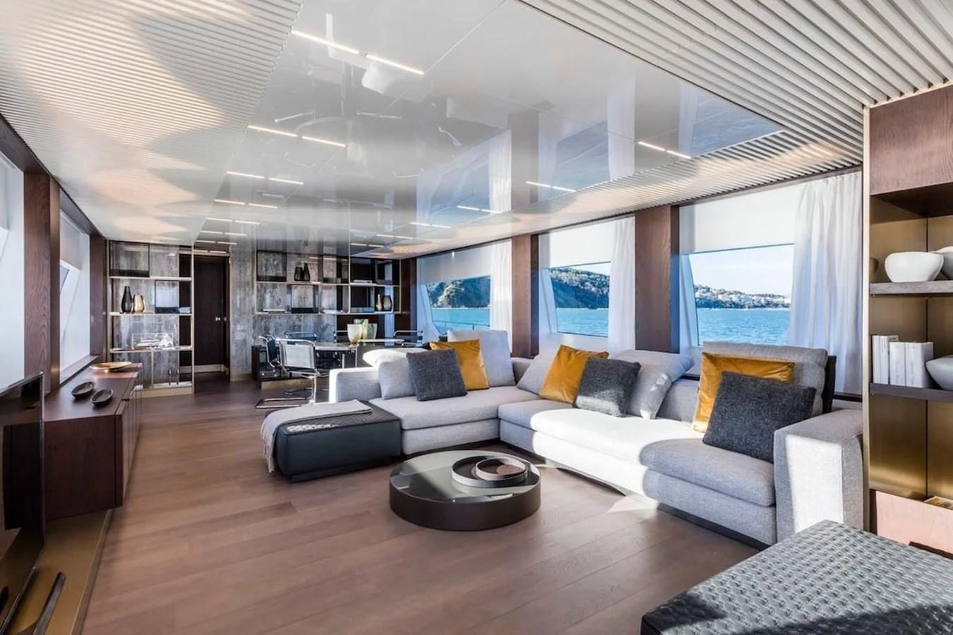 a living room with a large window aboard KATARIINA XO Yacht for Sale