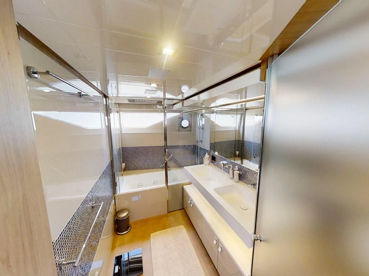a bathroom with a sink and a shower aboard KATARIINA XO Yacht for Sale