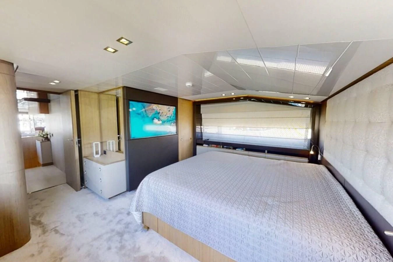 a room with a bed and a tv aboard KATARIINA XO Yacht for Sale
