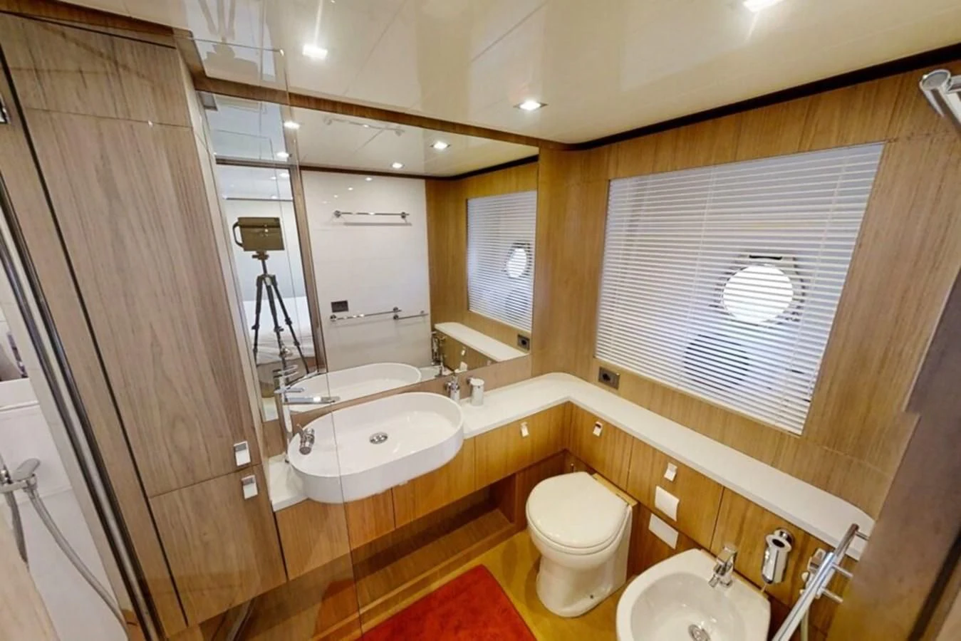 a bathroom with a toilet and sink aboard KATARIINA XO Yacht for Sale