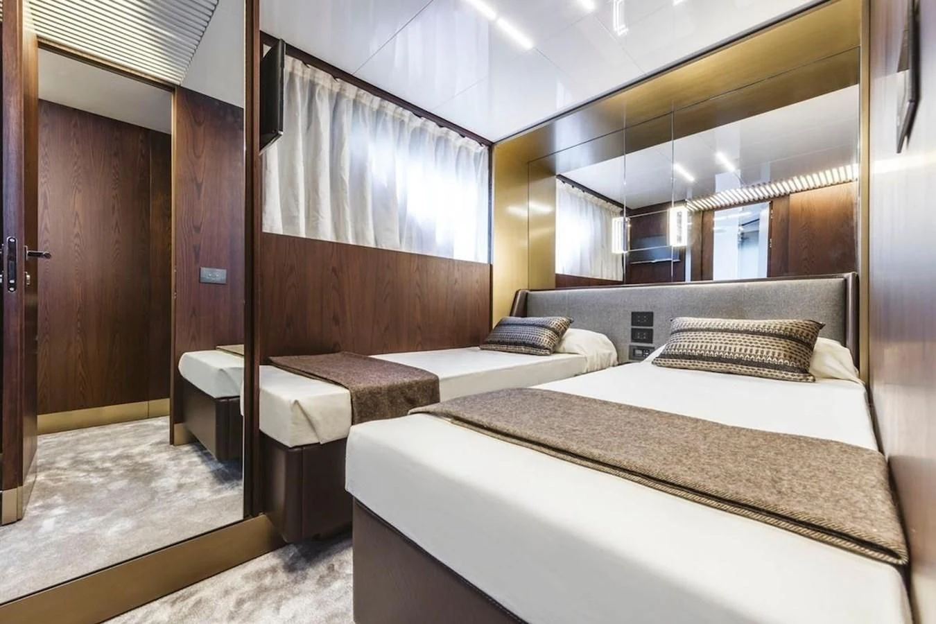 a room with two beds aboard KATARIINA XO Yacht for Sale