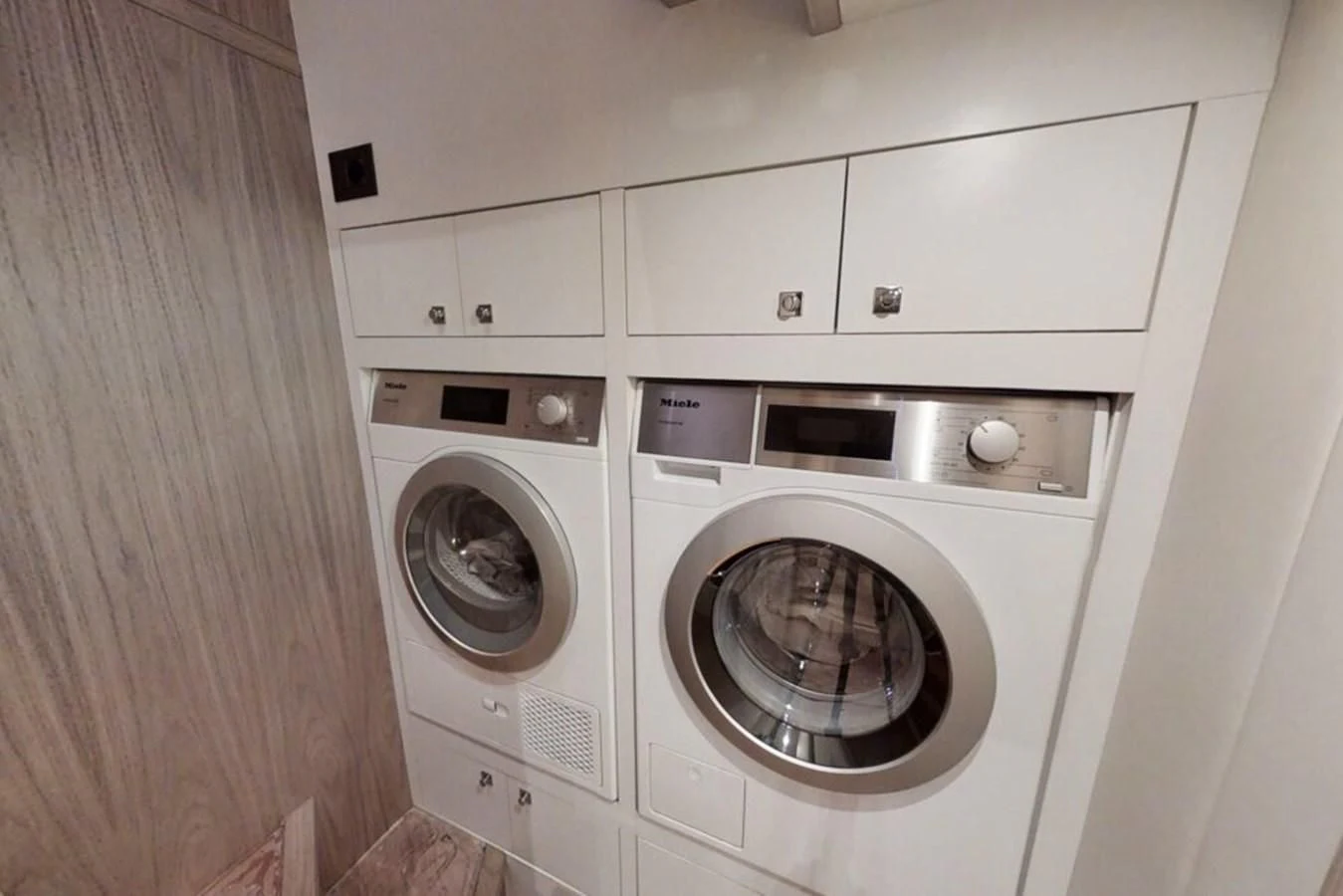 a white washing machine aboard KATARIINA XO Yacht for Sale