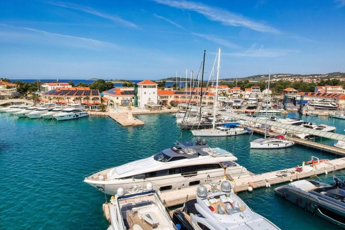 boats docked at a pier aboard KATARIINA XO Yacht for Sale