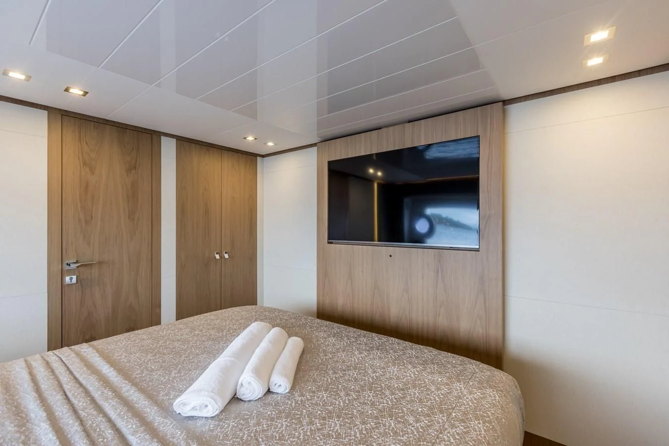 a bed in a room aboard KATARIINA XO Yacht for Sale