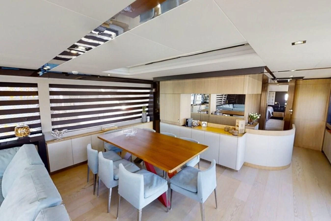 a room with a table and chairs aboard KATARIINA XO Yacht for Sale