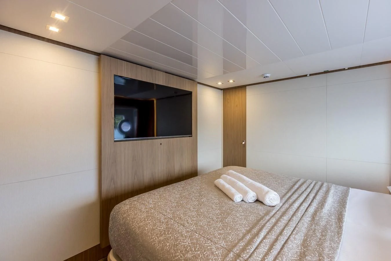 a bed in a room aboard KATARIINA XO Yacht for Sale