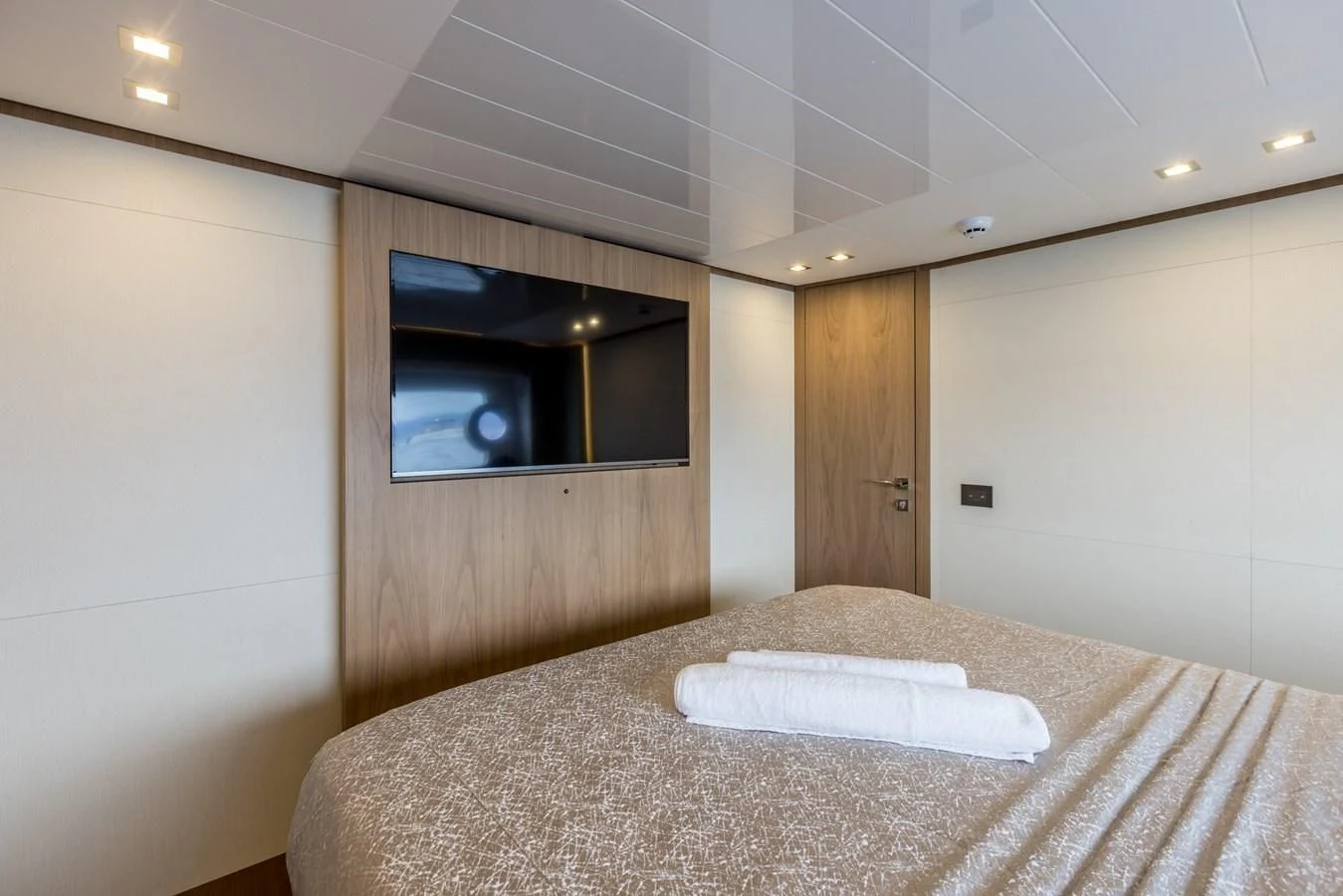 a bed in a room aboard KATARIINA XO Yacht for Sale