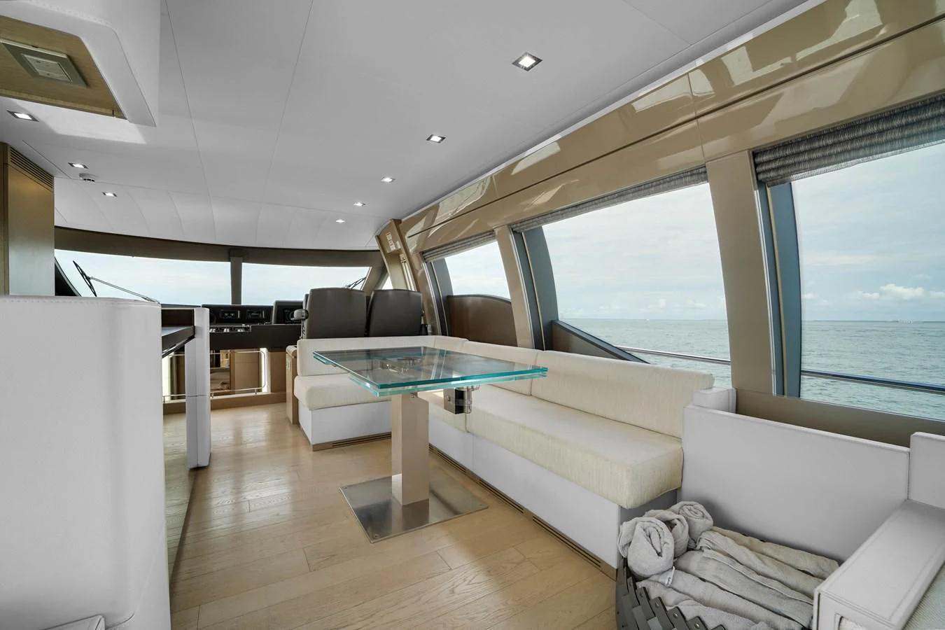 a room with a pool table and couches aboard KATARIINA XO Yacht for Sale