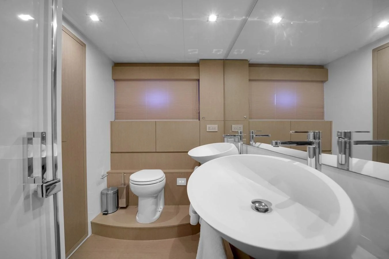 a bathroom with a sink and toilet aboard KATARIINA XO Yacht for Sale