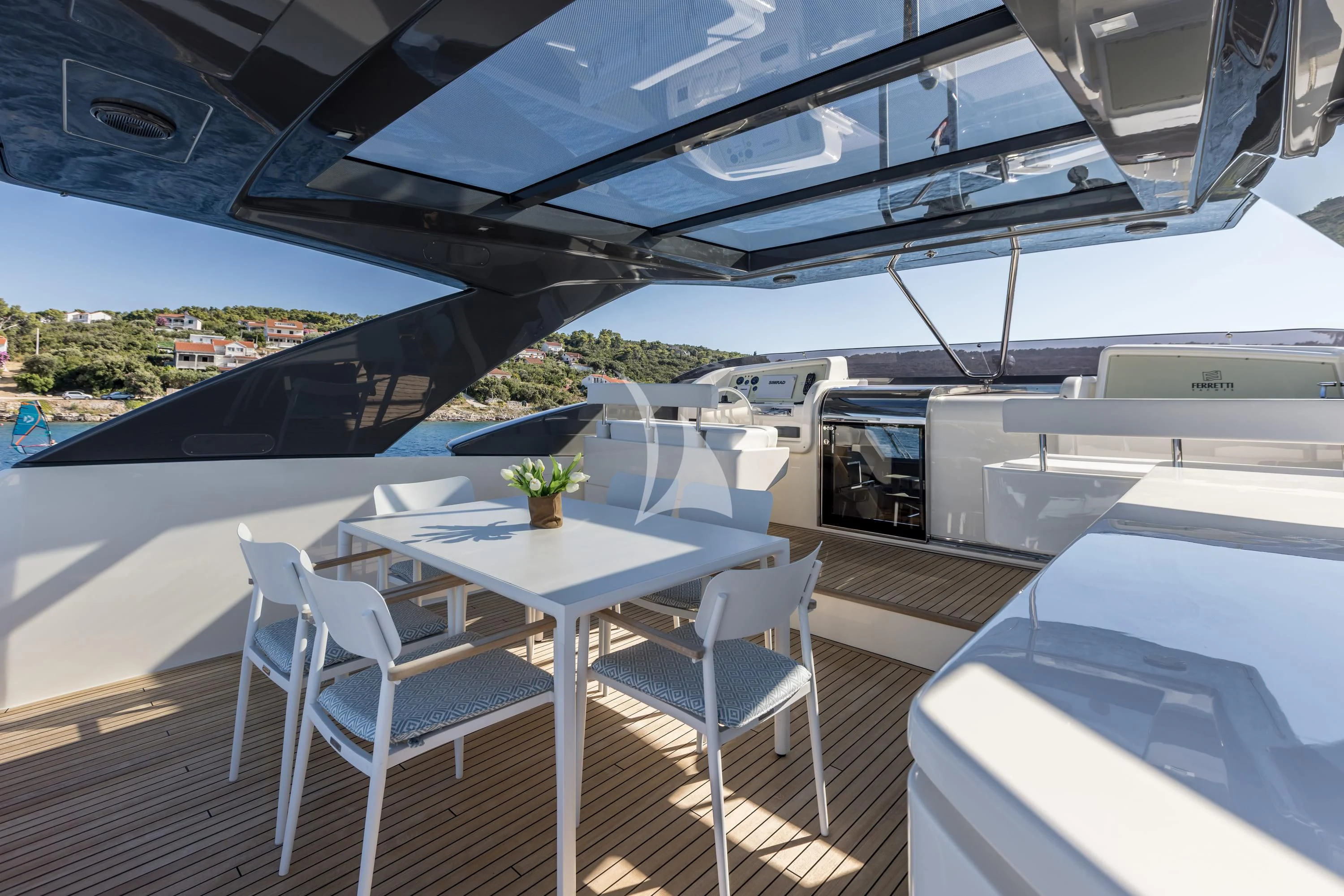 a table and chairs on a boat aboard KATARIINA XO Yacht for Sale