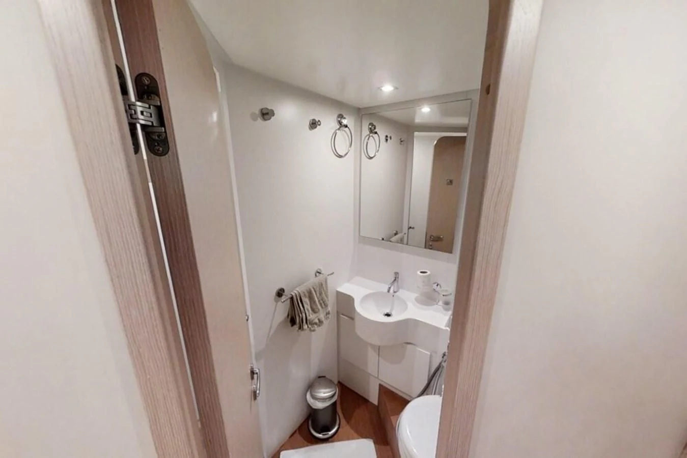 a bathroom with a sink and a mirror aboard KATARIINA XO Yacht for Sale